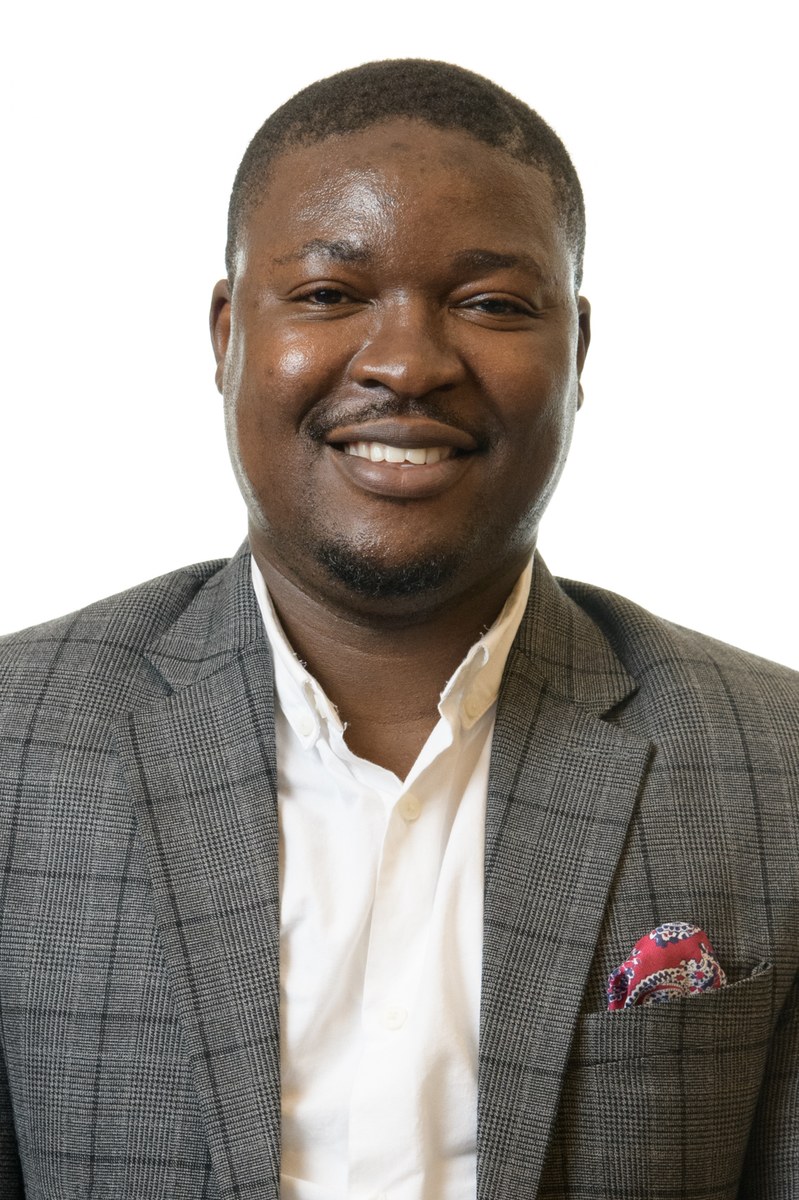Professional headshot of Mayowa Adeoti